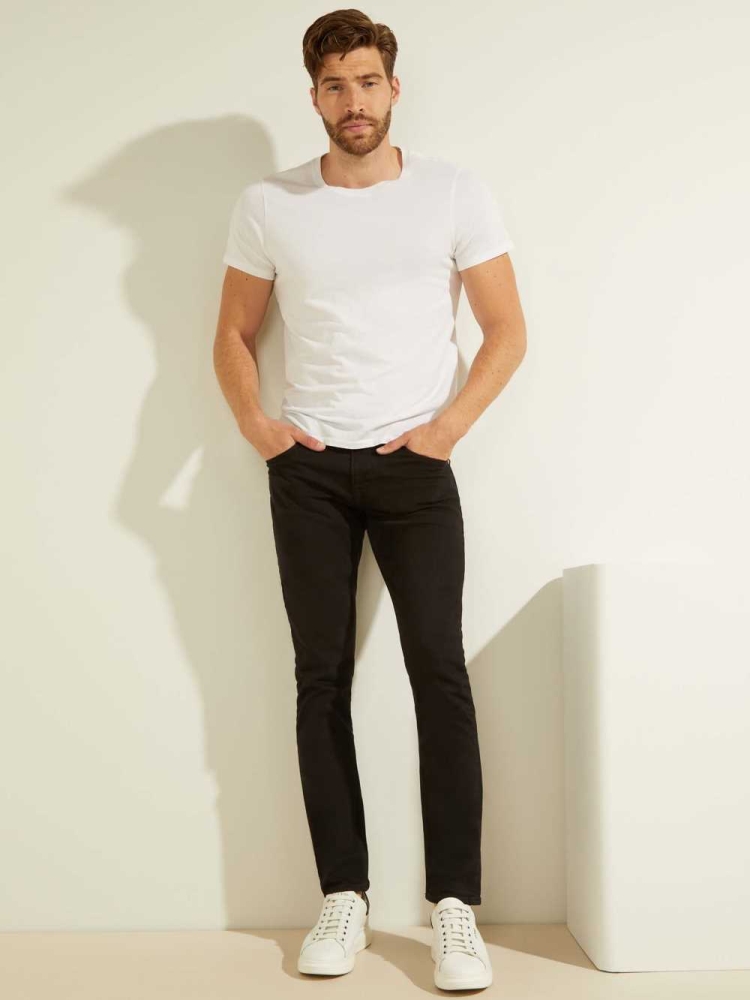 Black Men's GUESS Classic Solid Skinny Jeans | USA15DAHUF